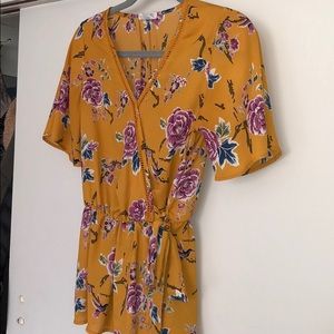 Yellow short sleeve wrap blouse